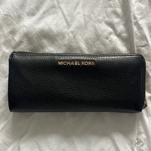 Michael Kors Black leather wallet with gold details